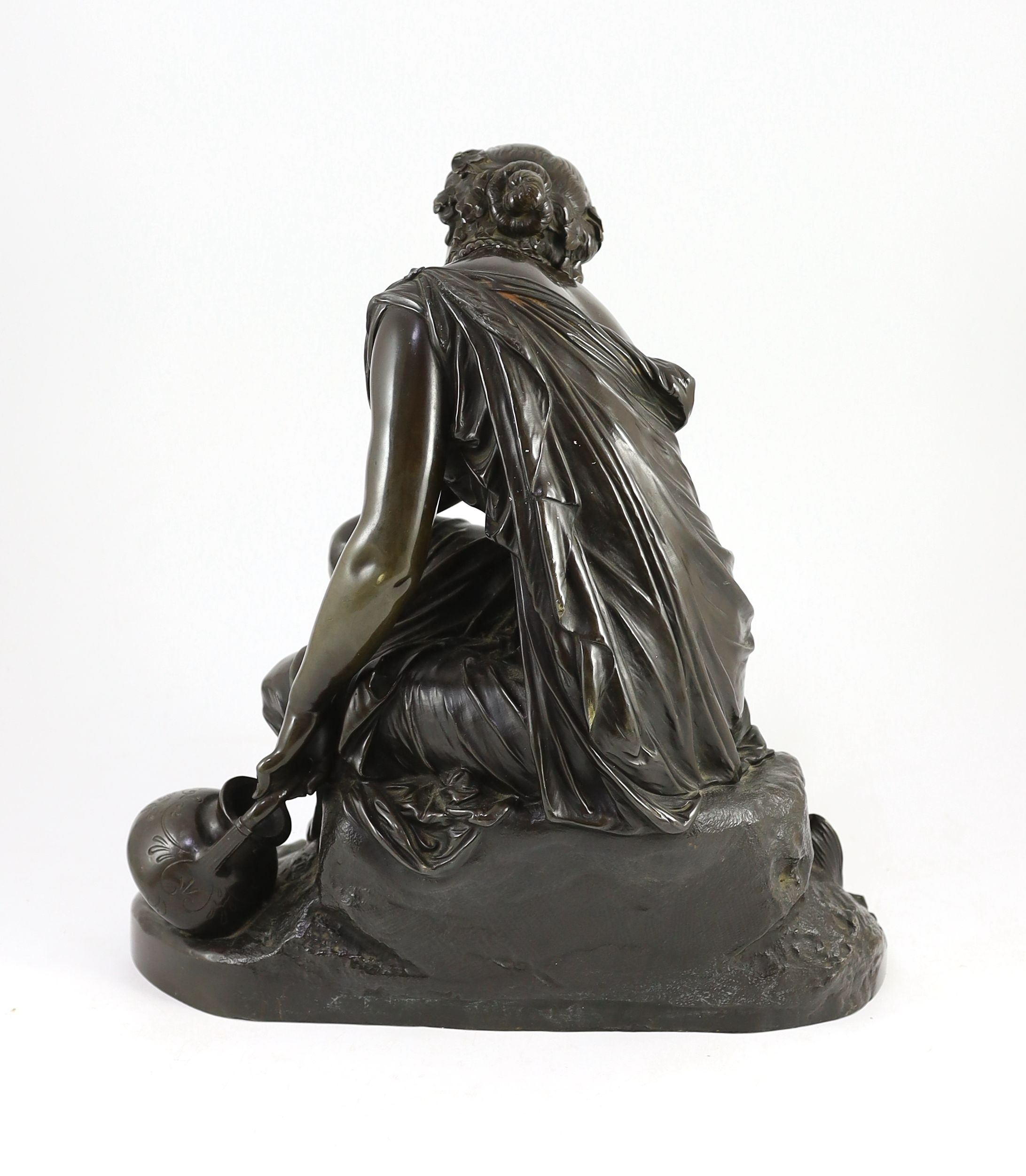 Alexandre Schoenewerk (French, 1820-1885). A 19th century German bronze figure of a classical water carrier, width 38cm, height 40cm